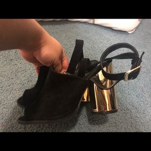 Black and gold heels